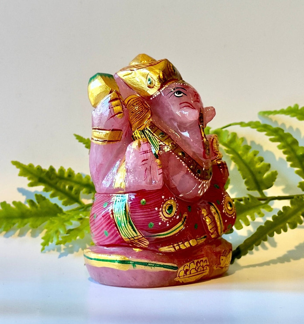Rose quartz painted ganesha carving