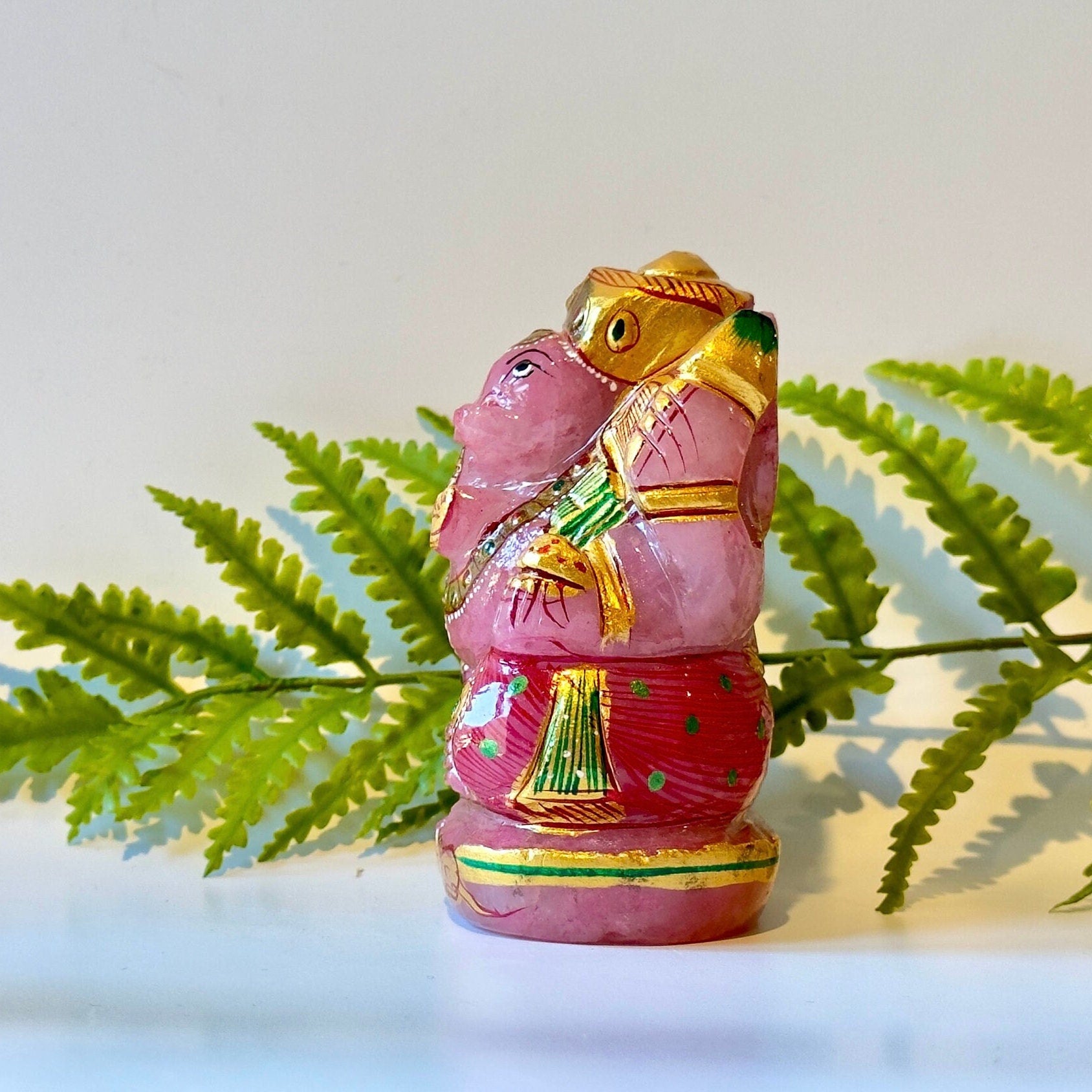 Rose quartz painted ganesha carving