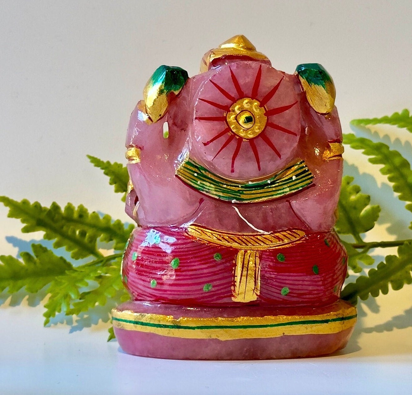 Rose quartz painted ganesha carving