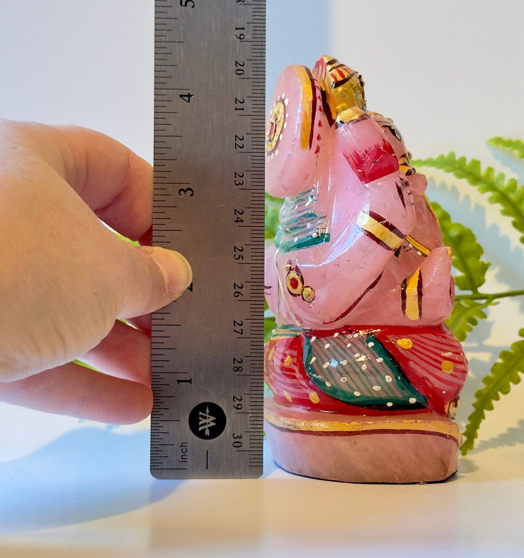 Rose quartz painted ganesha carving