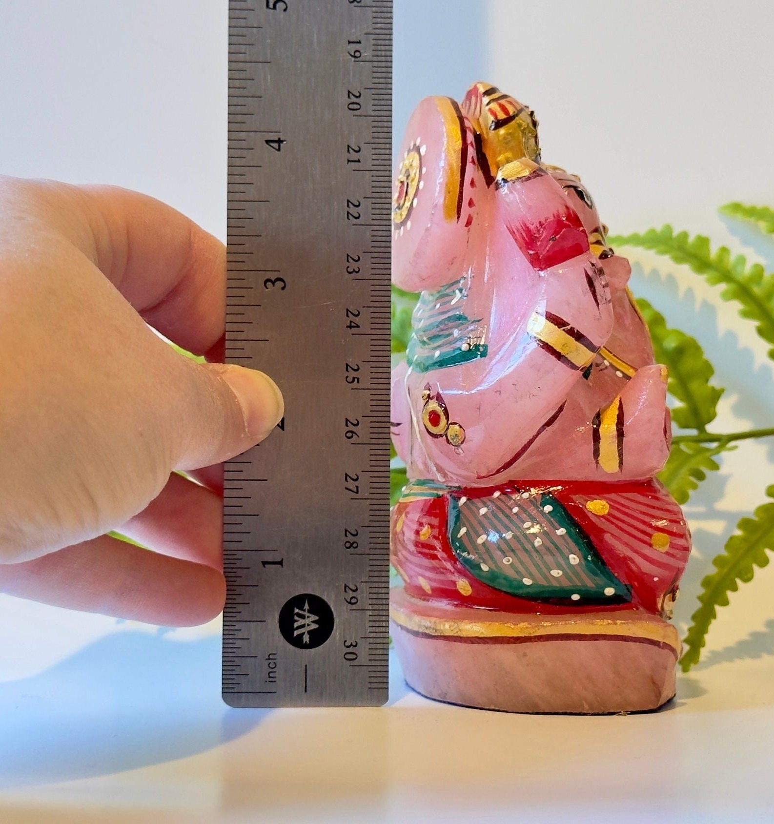 Rose quartz painted ganesha carving