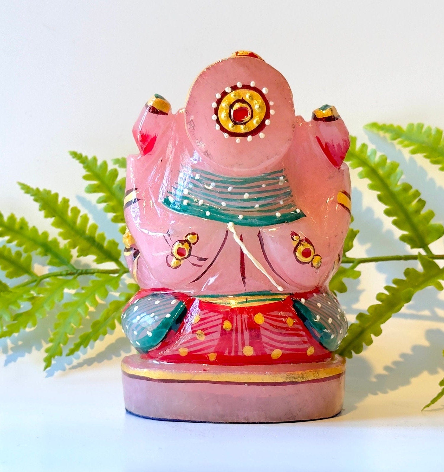Rose quartz painted ganesha carving