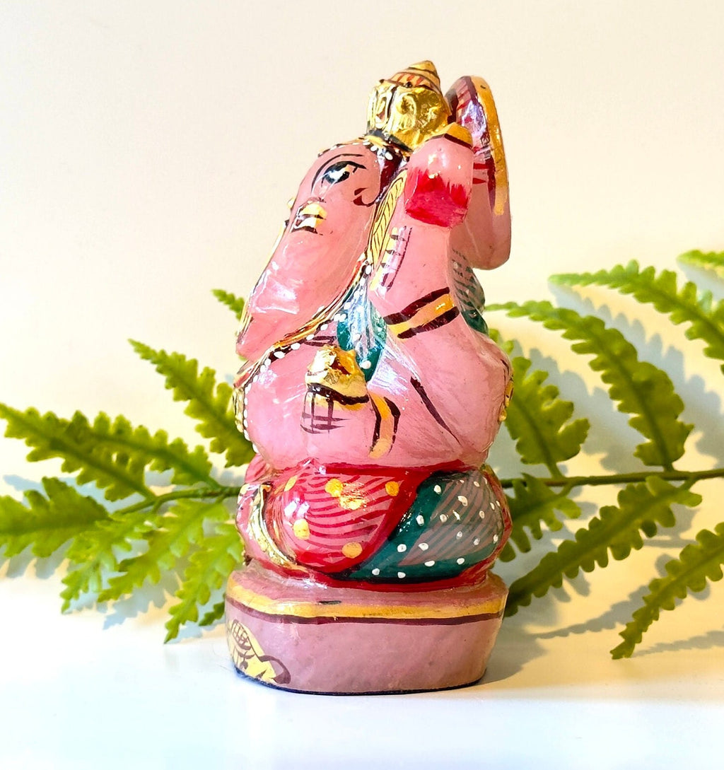 Rose quartz painted ganesha carving