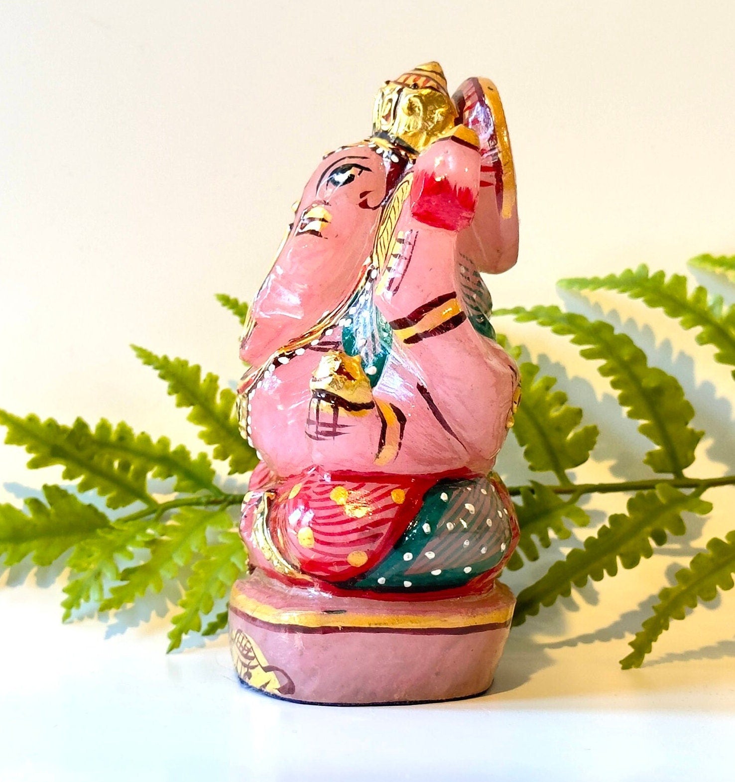 Rose quartz painted ganesha carving