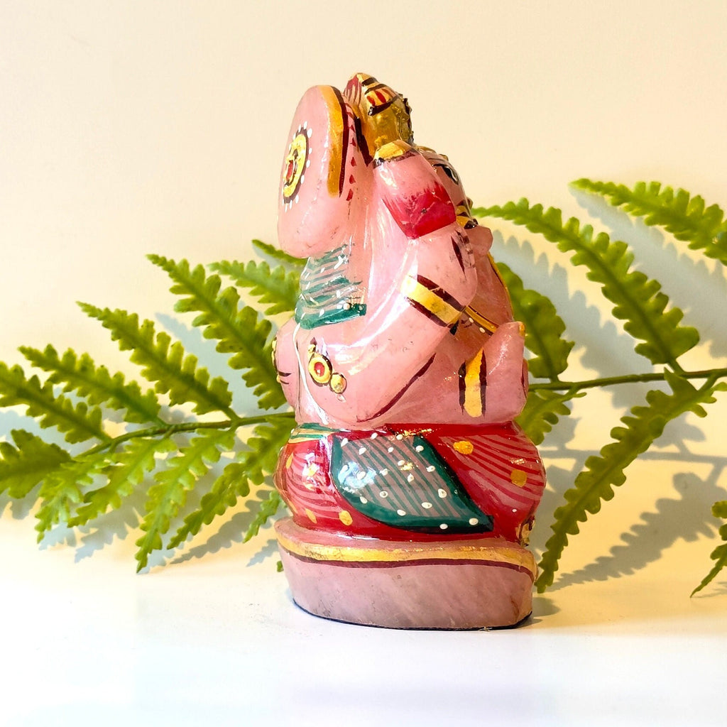 Rose quartz painted ganesha carving