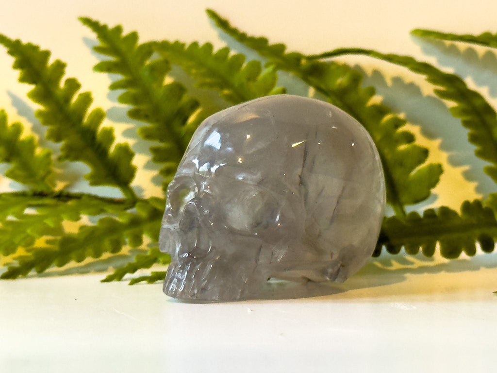 2" jawless quartz skull, detailed carve.