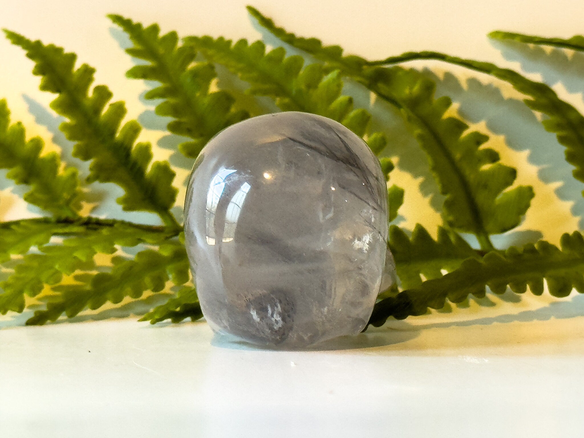 2" jawless quartz skull, detailed carve.