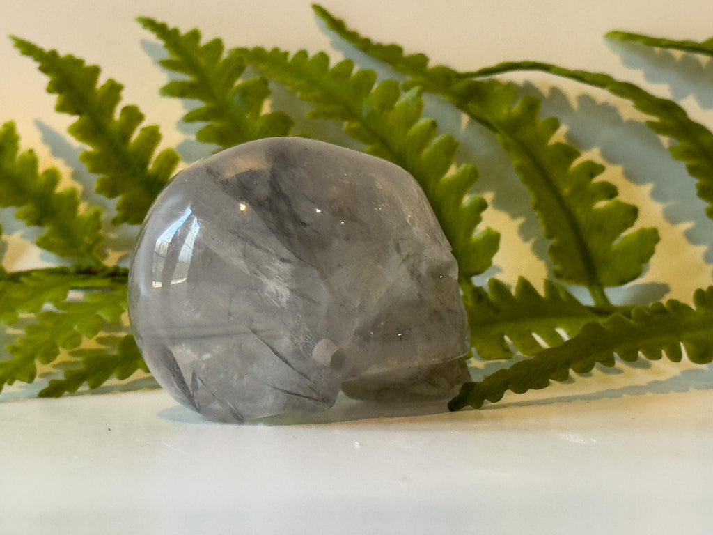 2" jawless quartz skull, detailed carve.