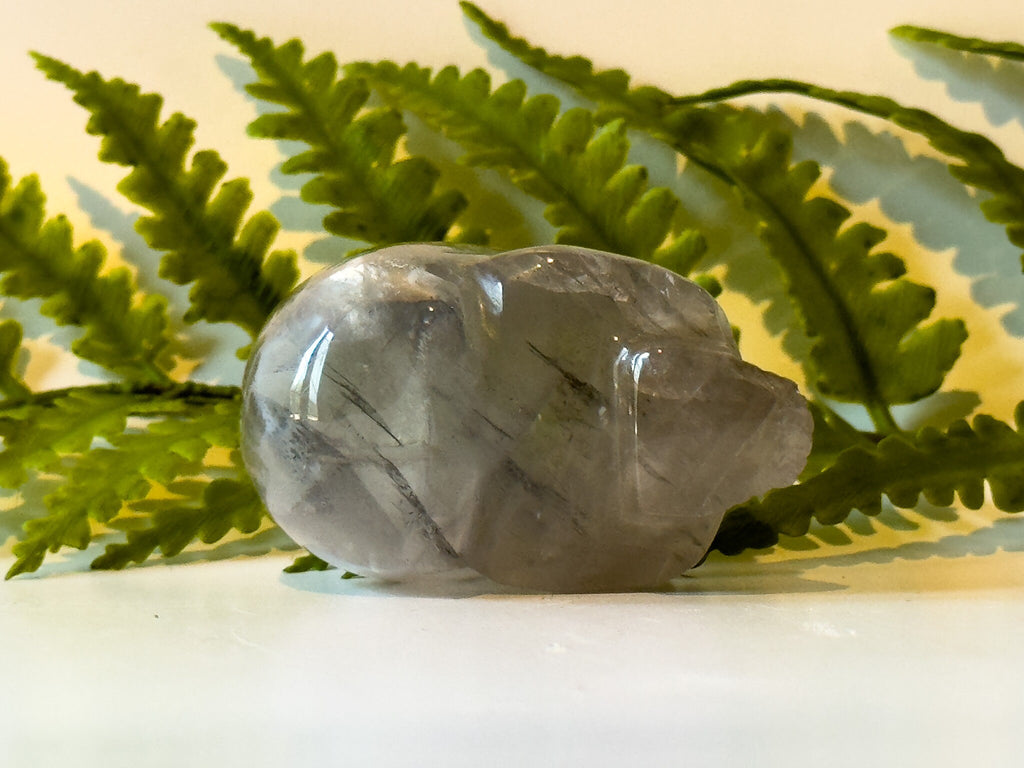 2" jawless quartz skull, detailed carve.