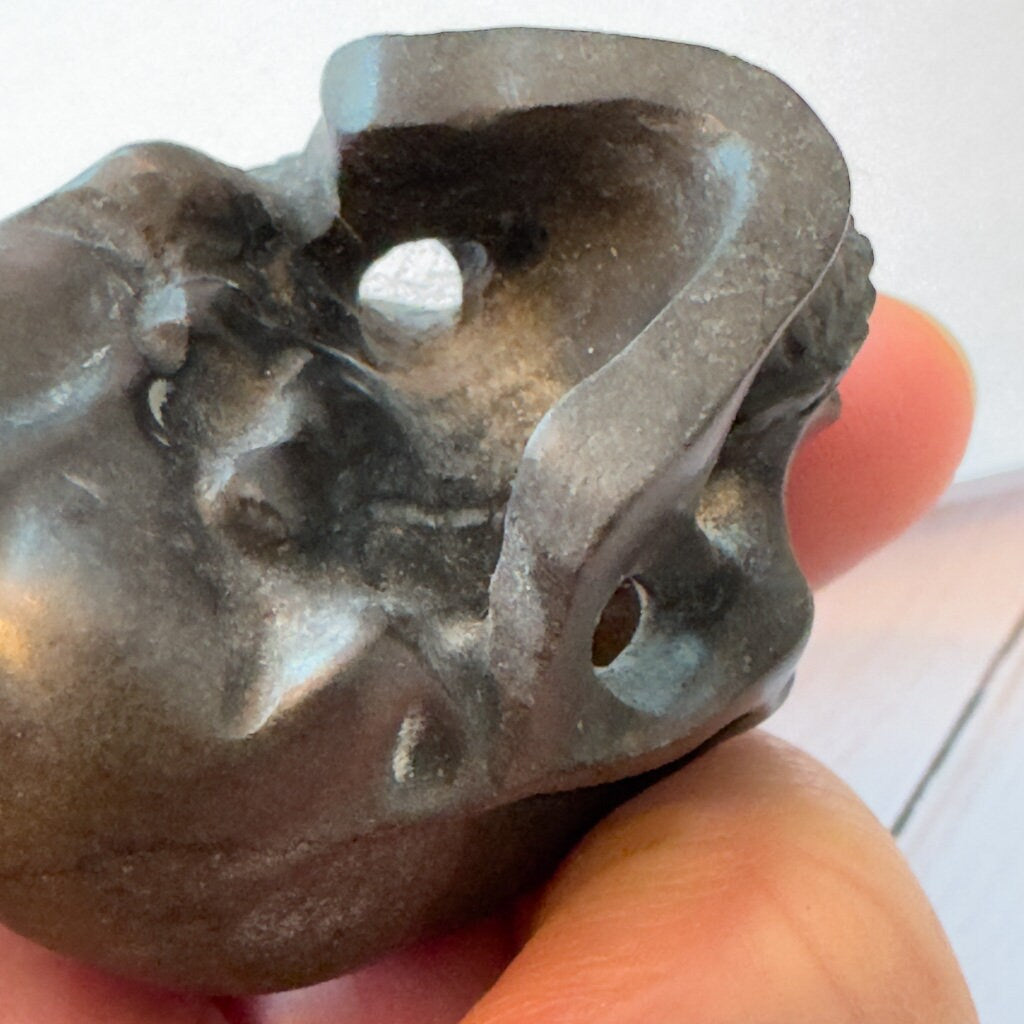 Adorable shale skull carved by Artifactual.