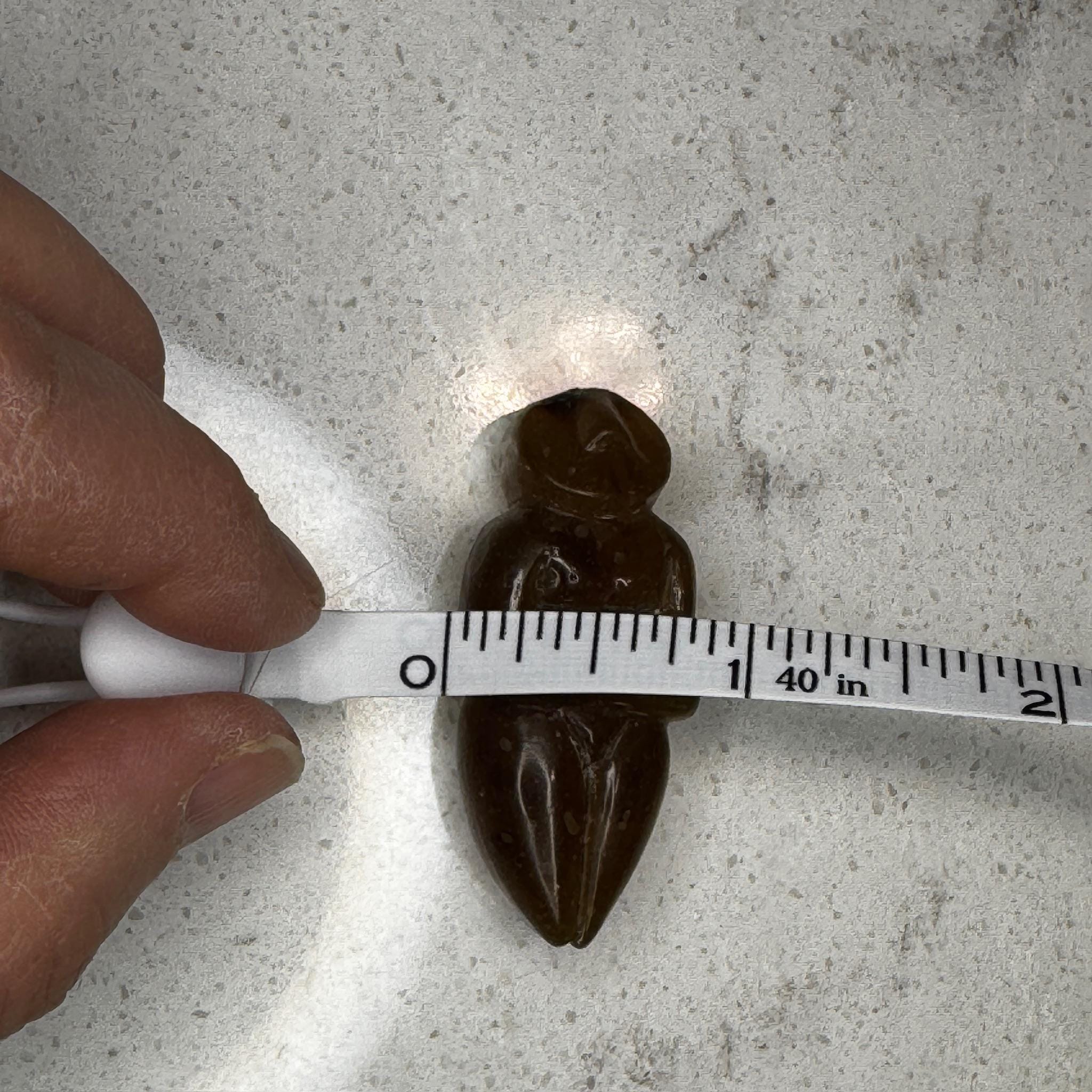 Beautiful smooth, honey amber goddess carving from Artifactual.