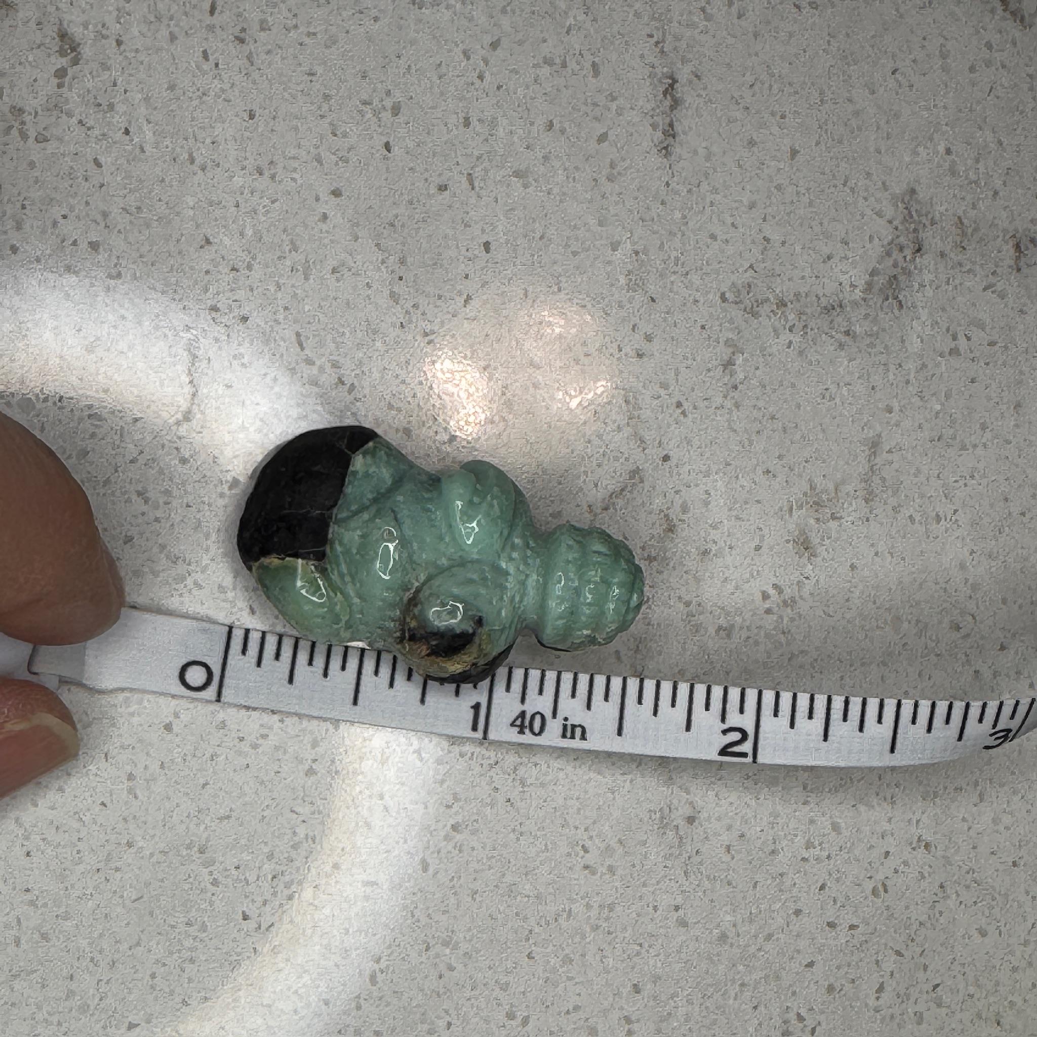 Beautiful turquoise carved goddess by Artifactual.