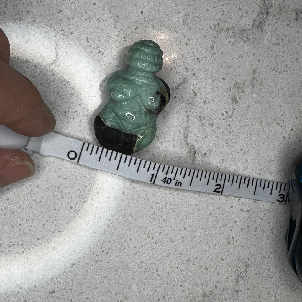 Beautiful turquoise carved goddess by Artifactual.