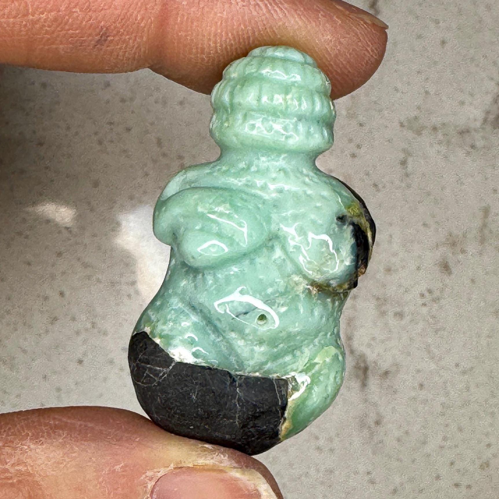 Beautiful turquoise carved goddess by Artifactual.