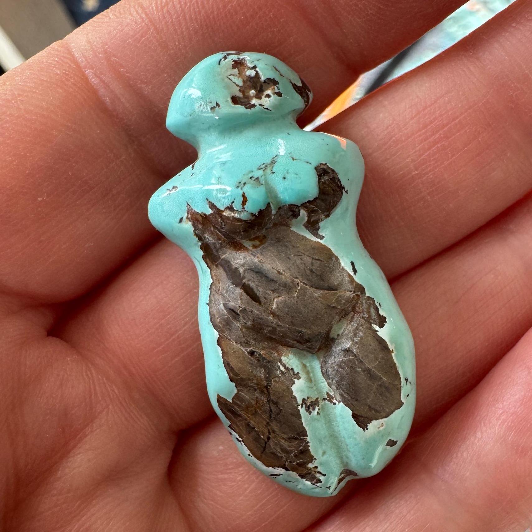 This is a stunning turquoise carved goddess we got from Artifactual