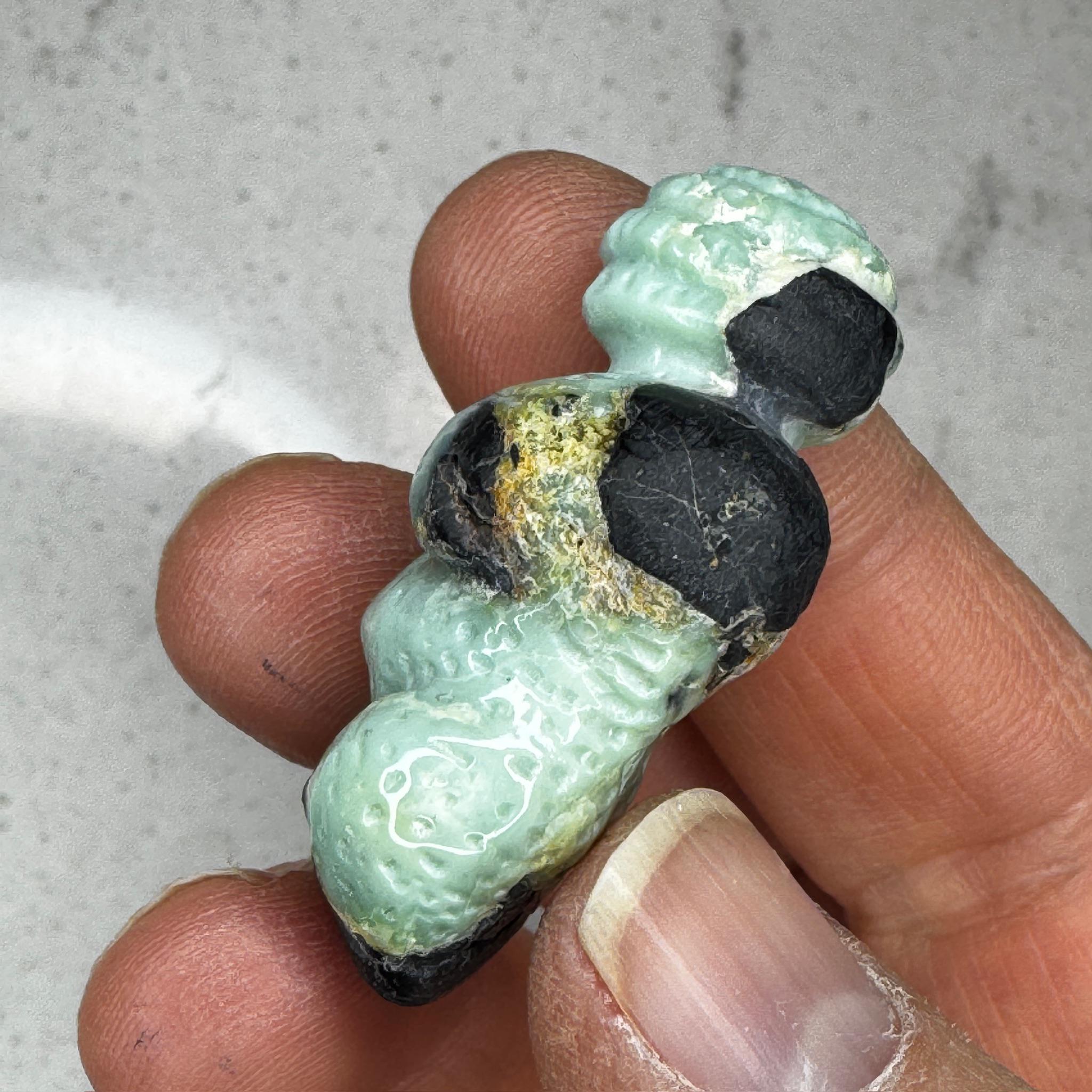Beautiful turquoise carved goddess by Artifactual.