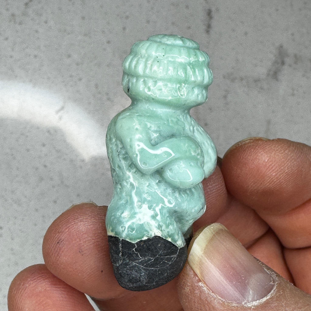 Beautiful turquoise carved goddess by Artifactual.