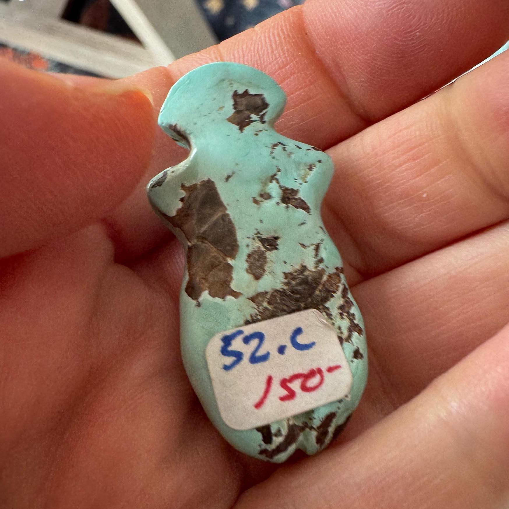 This is a stunning turquoise carved goddess we got from Artifactual